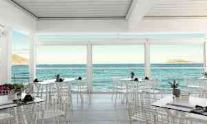 Restaurant med udsigt over havet gennem store vinduer. (AI-genereret tekst)