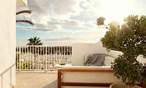 En solrig terrasse med hvide vægge, møbler, en plante i potte og udsigt over huse og træer. (AI-genereret tekst)