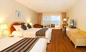 Lyst og luksuriøst dobbeltværelse deluxe med havudsigt