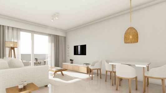 Et lyst opholdsstue med en sofa, spisebord og TV. (AI-genereret tekst)