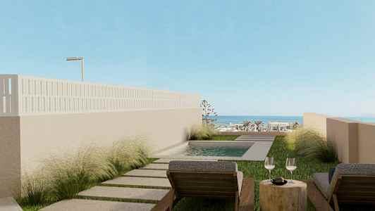 To liggestole ved en lille pool med udsigt til havet. (AI-genereret tekst)