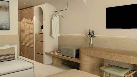 Moderne hotelværelse med siddeområde, TV og et garderobeskab. (AI-genereret tekst)