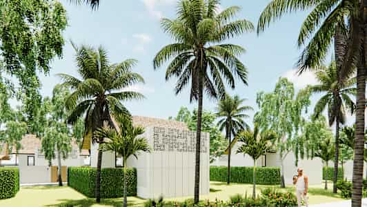 Tropisk have med palmer og buske, omgivet af bygninger med hvide facader. (AI-genereret tekst)