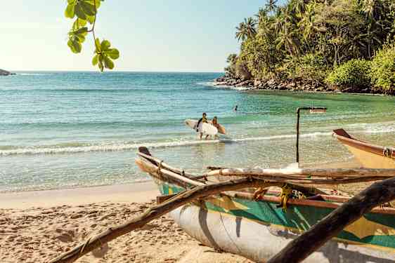 surfbrætter på stranden
