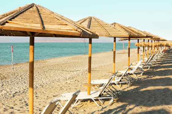 Parasoller på strand