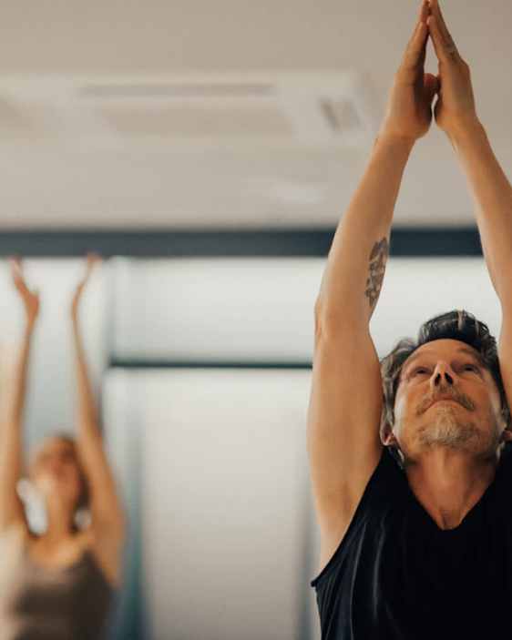 Man and woman during yoga session