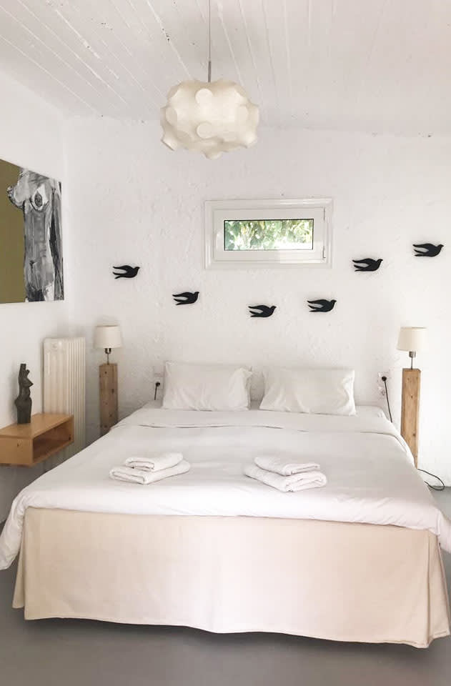 Soveværelset i en 2-værelses lejlighed i villa