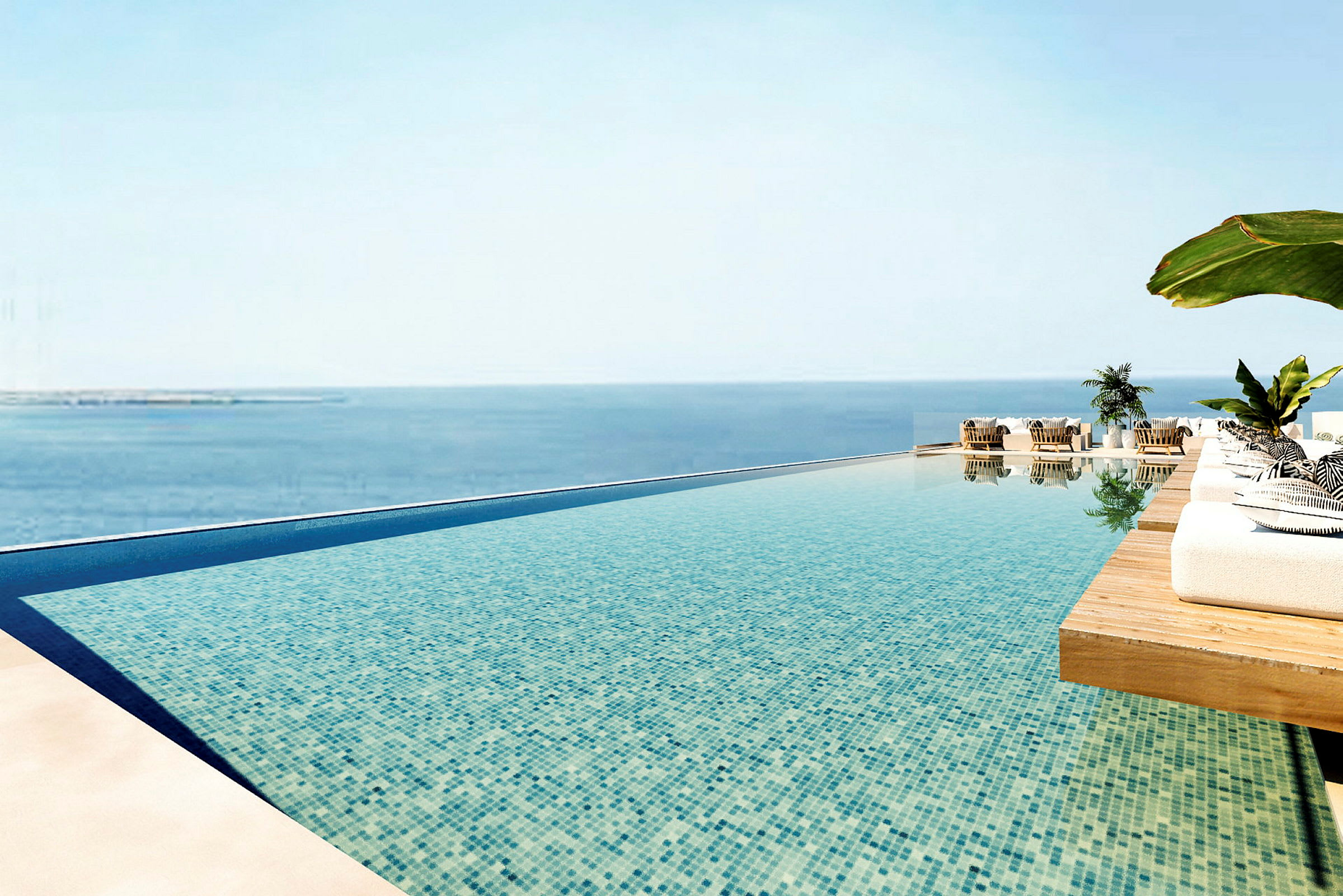 En infinitypool med udsigt over havet og solsenge omkring. (AI-genereret tekst)