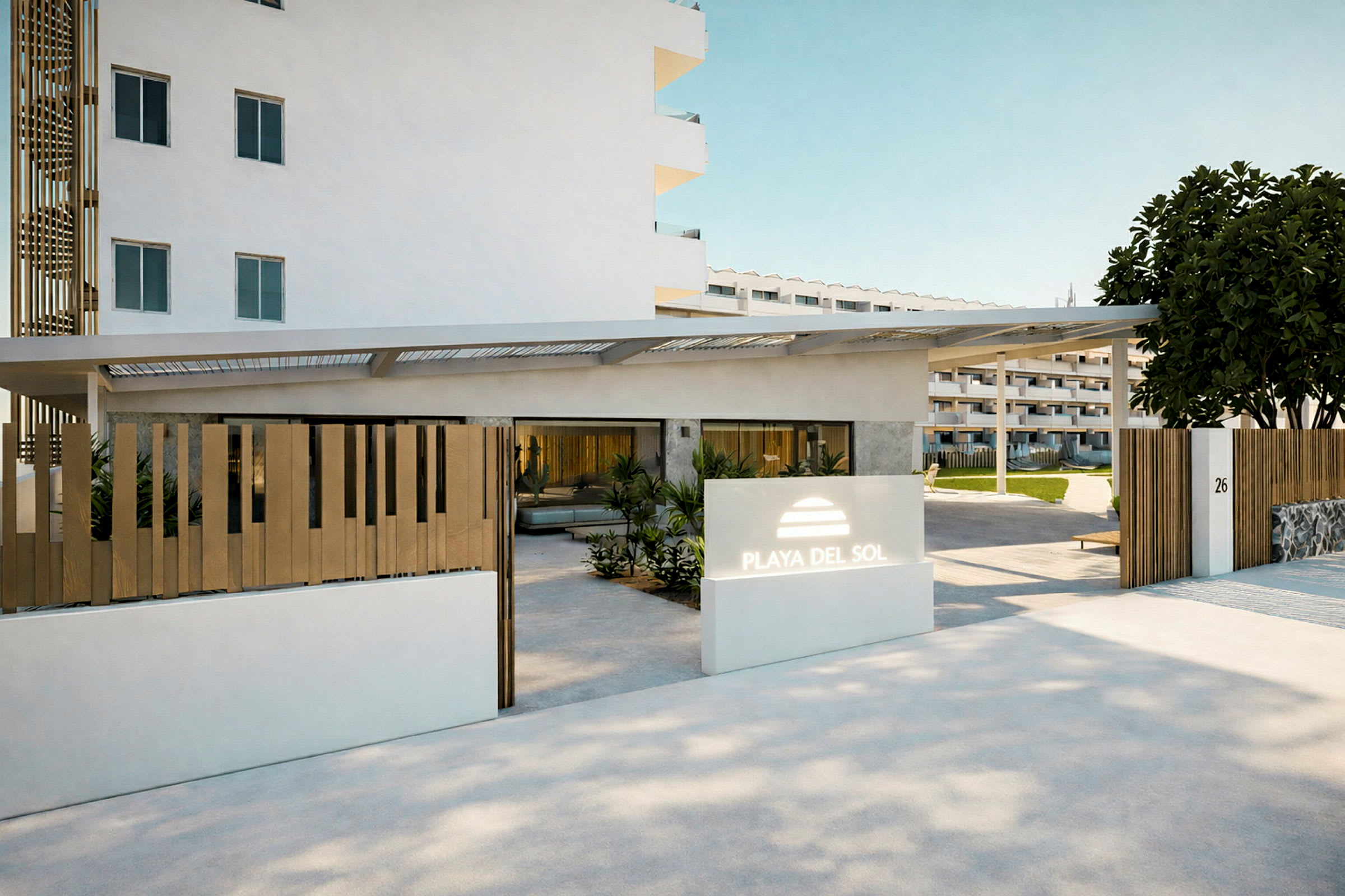 Indgang til hotelområdet med navnet Playa del Sol, inkluderende moderne arkitektur og planter omkring bygningerne. (AI-genereret tekst)