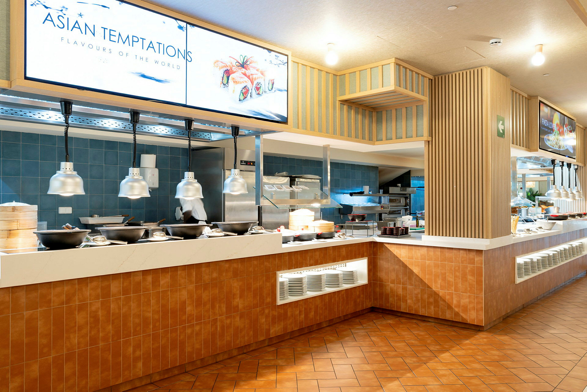 Buffetområde i en restaurant med asiatisk tema. (AI-genereret tekst)