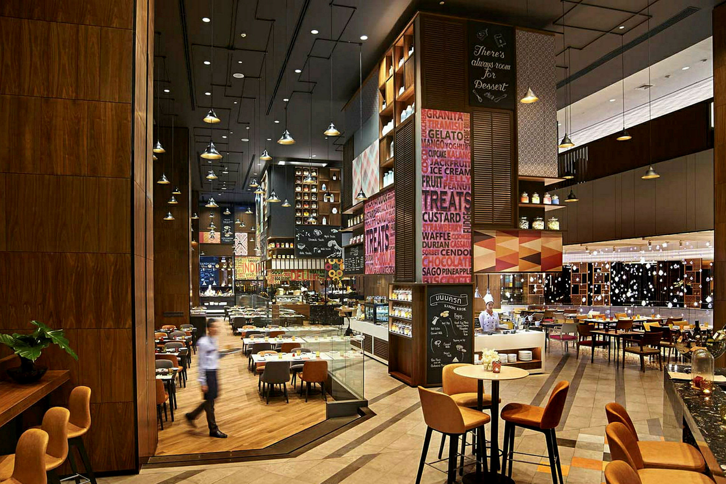 Billede af et moderne restaurantinteriør med forskellige siddepladser, dekorationer og belysningsdetaljer. (AI-genereret tekst)